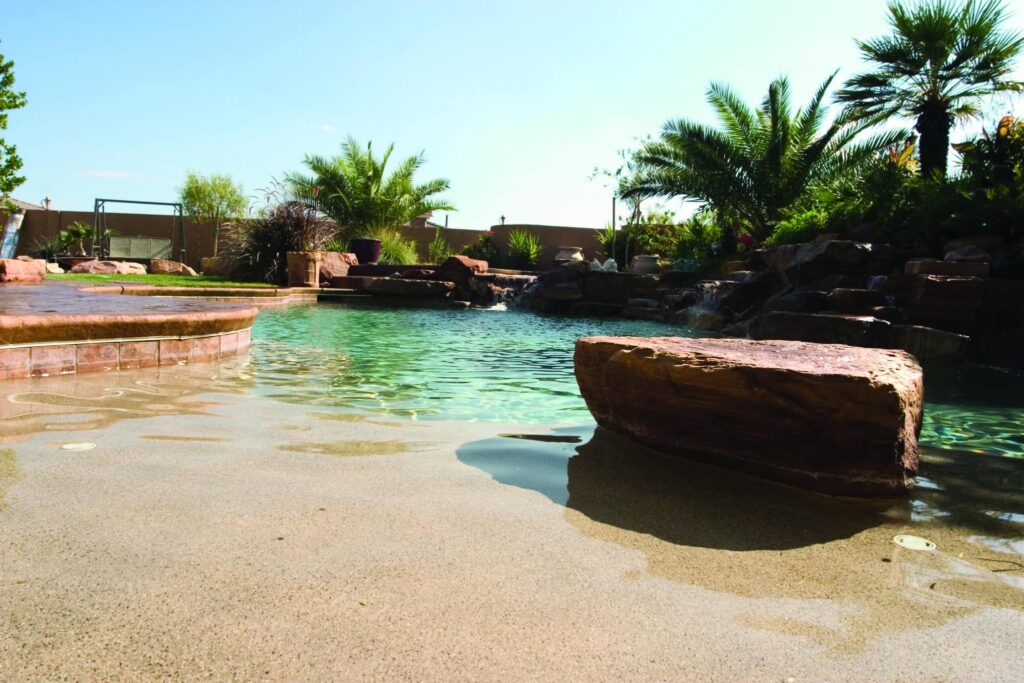 Tropical pool with rock formations.