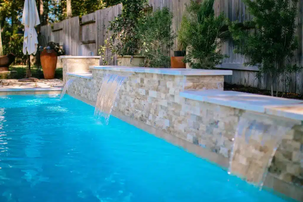 Elegant pool with cascading water features.